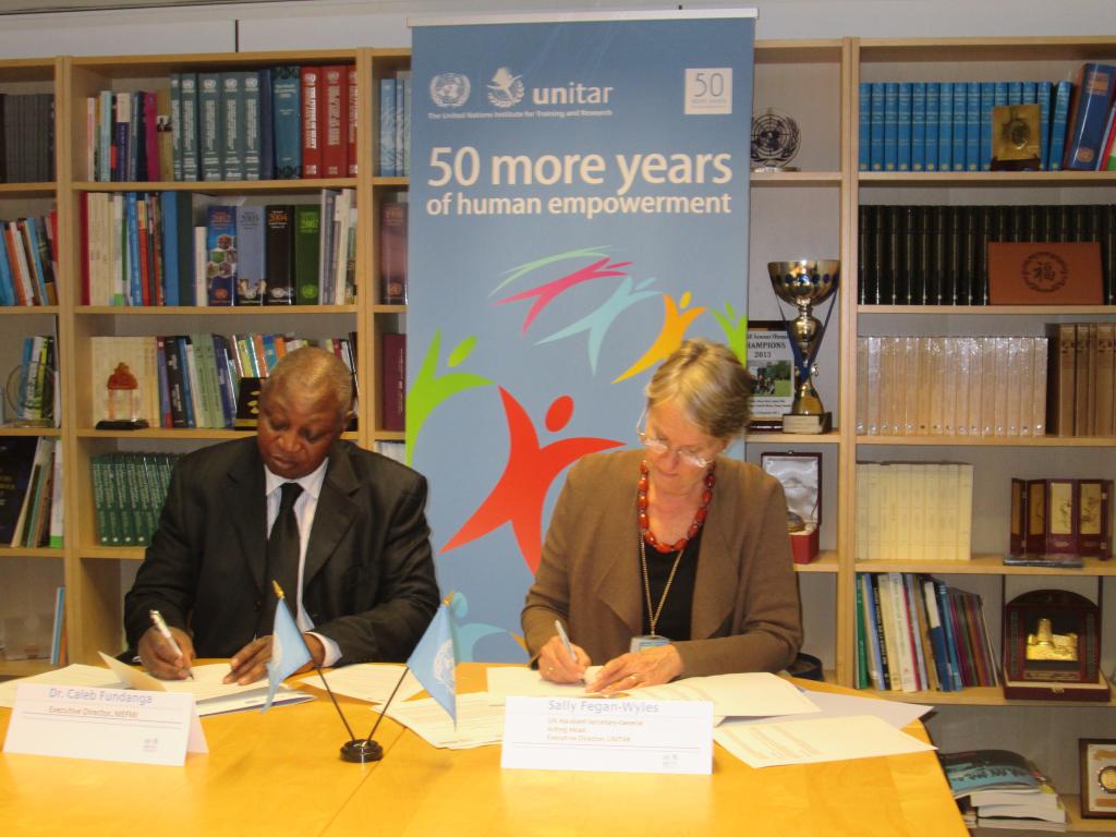 Dr Caleb Fundanga, Executive Director of MEFMI and Ms Sally Fegan-Wyles, Executive Director of UNITAR at the signing ceremony.
