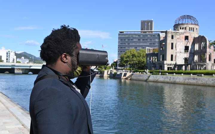 UNITAR staff using the virtual reality googles at the Peace Memorial Park in Hiroshima 