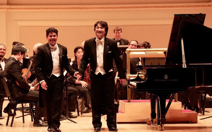 Left: Mr. Jorge Soto, Conducotor; Right: Mr. Byron Wei-Xin Zhou, Piano Soloist