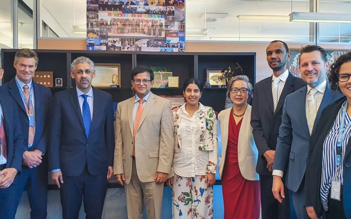 Dr. Sidi Ould Tah, BADEA Director General (third from left) and Mr. Nikhil Seth, Executive Director of UNITAR (fourth from left) pose with staff of UNITAR and BADEA.