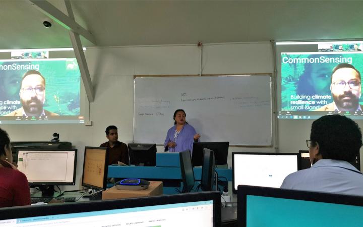 Training facilitator connecting from Bangkok, supported by the in-country expert, interacting with the participants in Suva, Fiji.