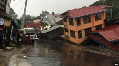Apartments are destroyed following a landslide in Harkhar, Chin State of Myanmar, July 30. (Photo AFP)